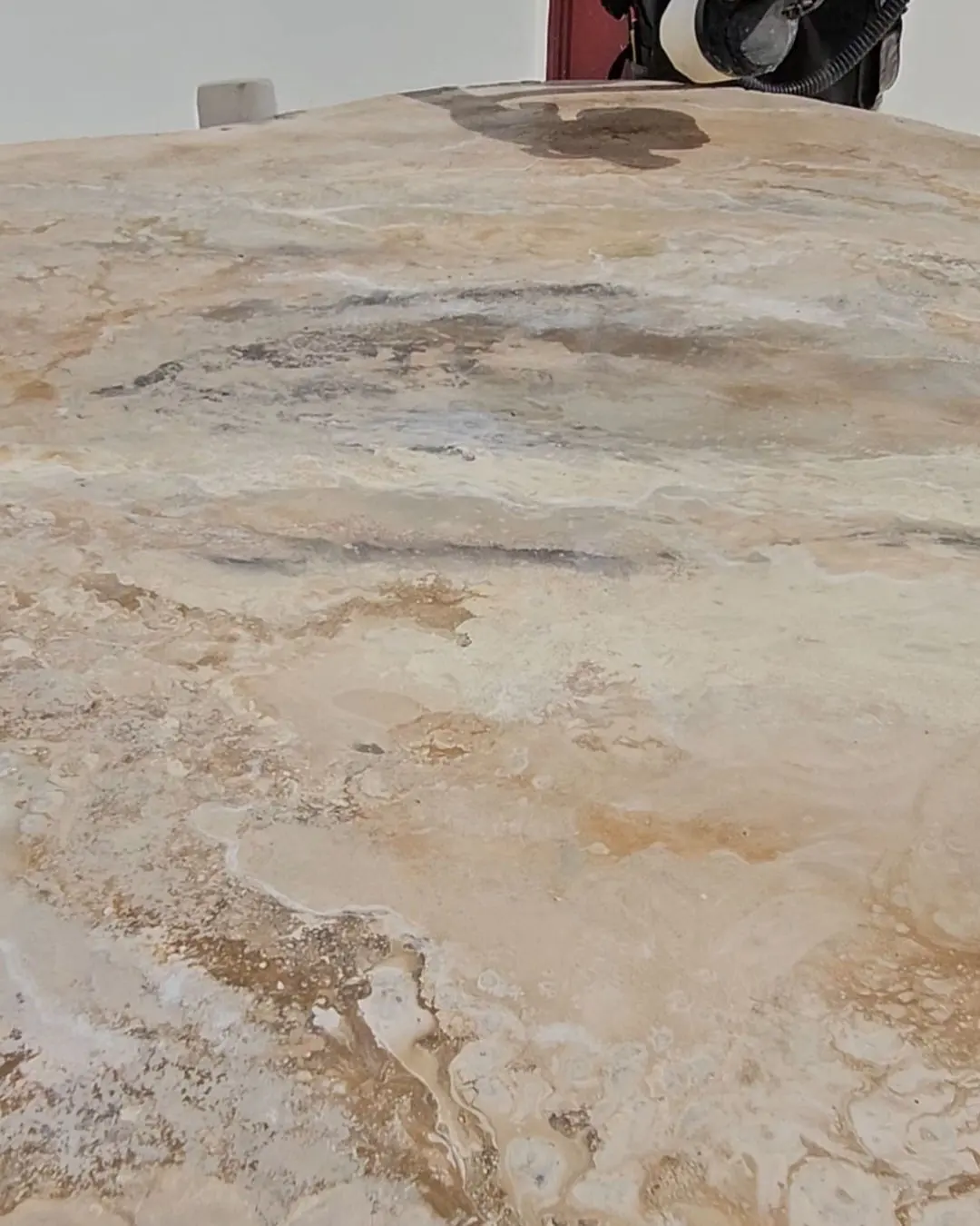 The stone texture across the surface of the tabletop