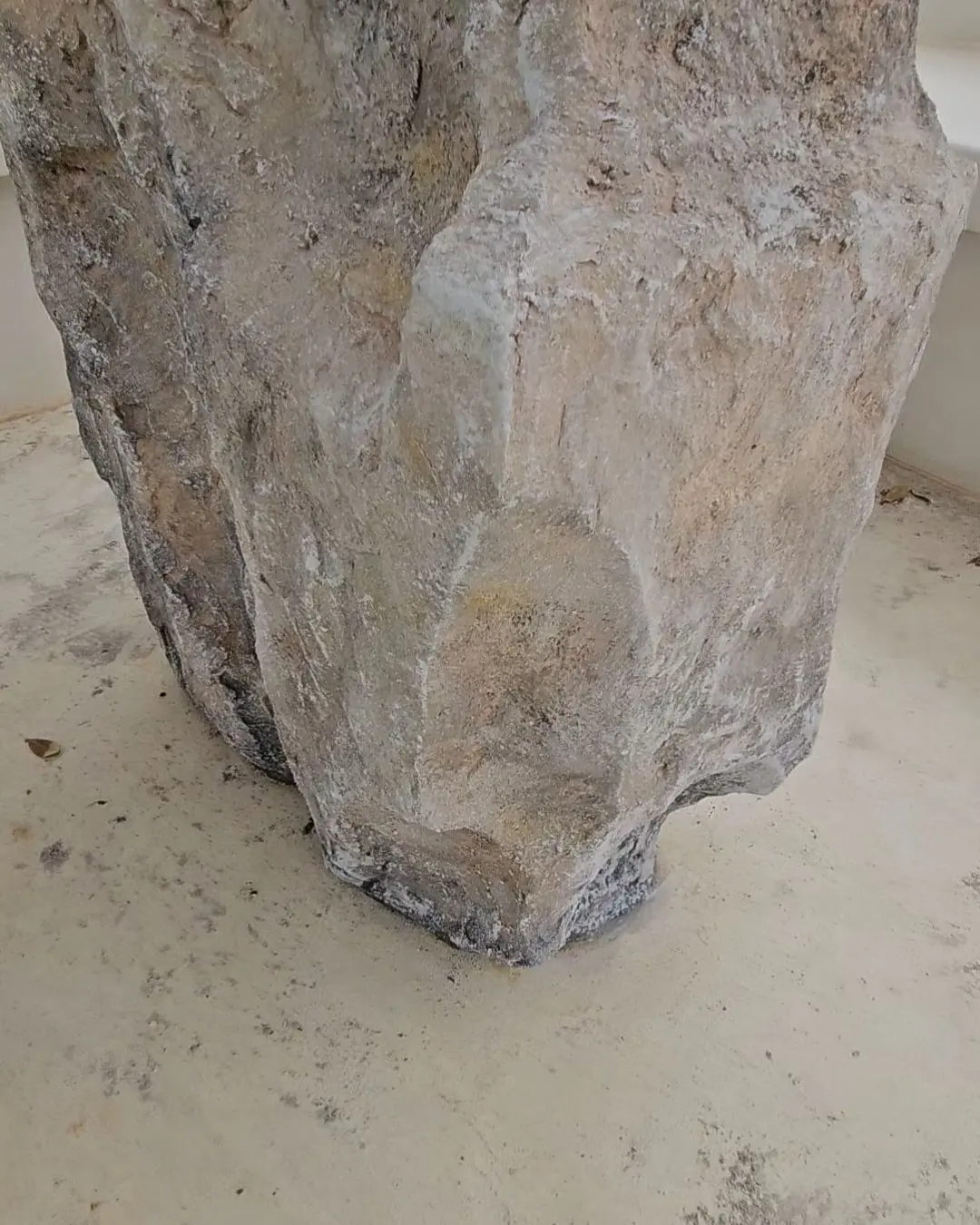 Detail of the pedestal's hand-worked surface